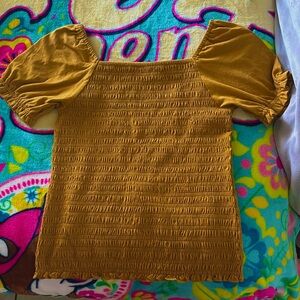 I am selling a There Abouts blouse that I bought but never wore not even once.